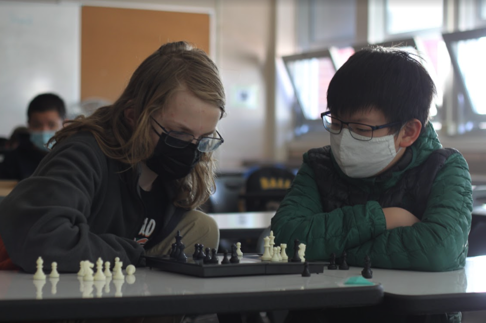 Students playing chess